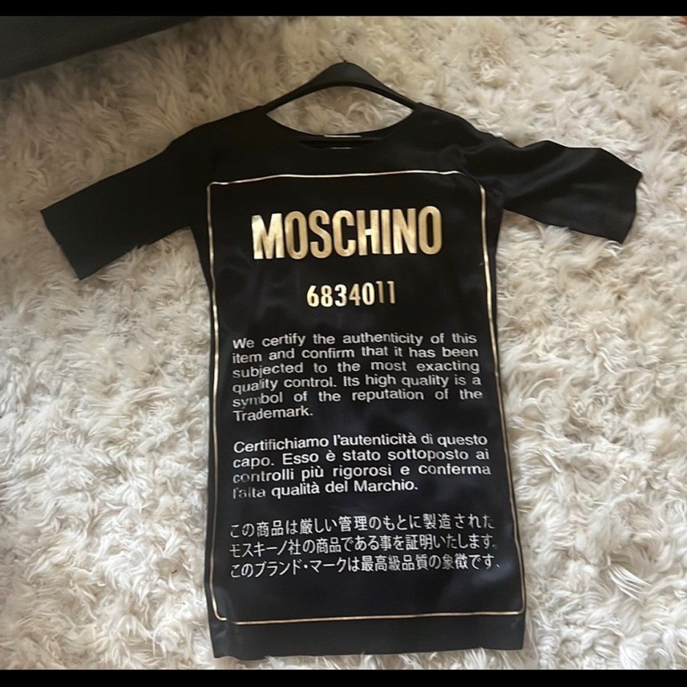 Woman beautiful woman size small moschino dress NWOT never been worn